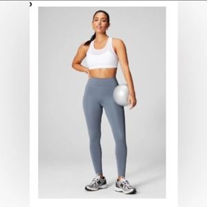 Fabletics Women High Waisted leggings Blue with side pockets Size Sm. NWT